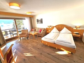 Comfort Quadruple Room, Balcony, Mountain View | Minibar, in-room safe, blackout drapes, soundproofing