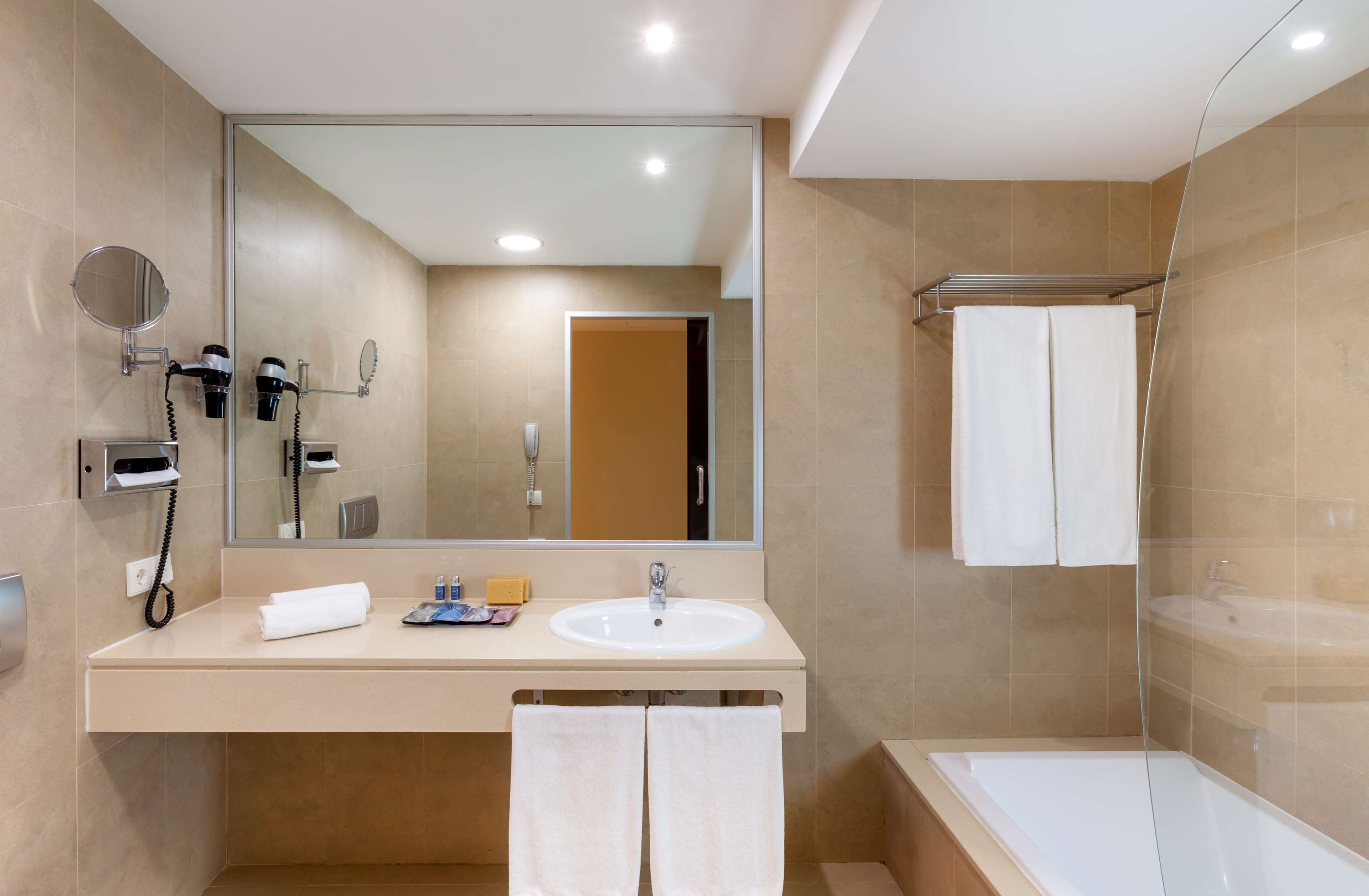 free toiletries, hair dryer, bidet, towels