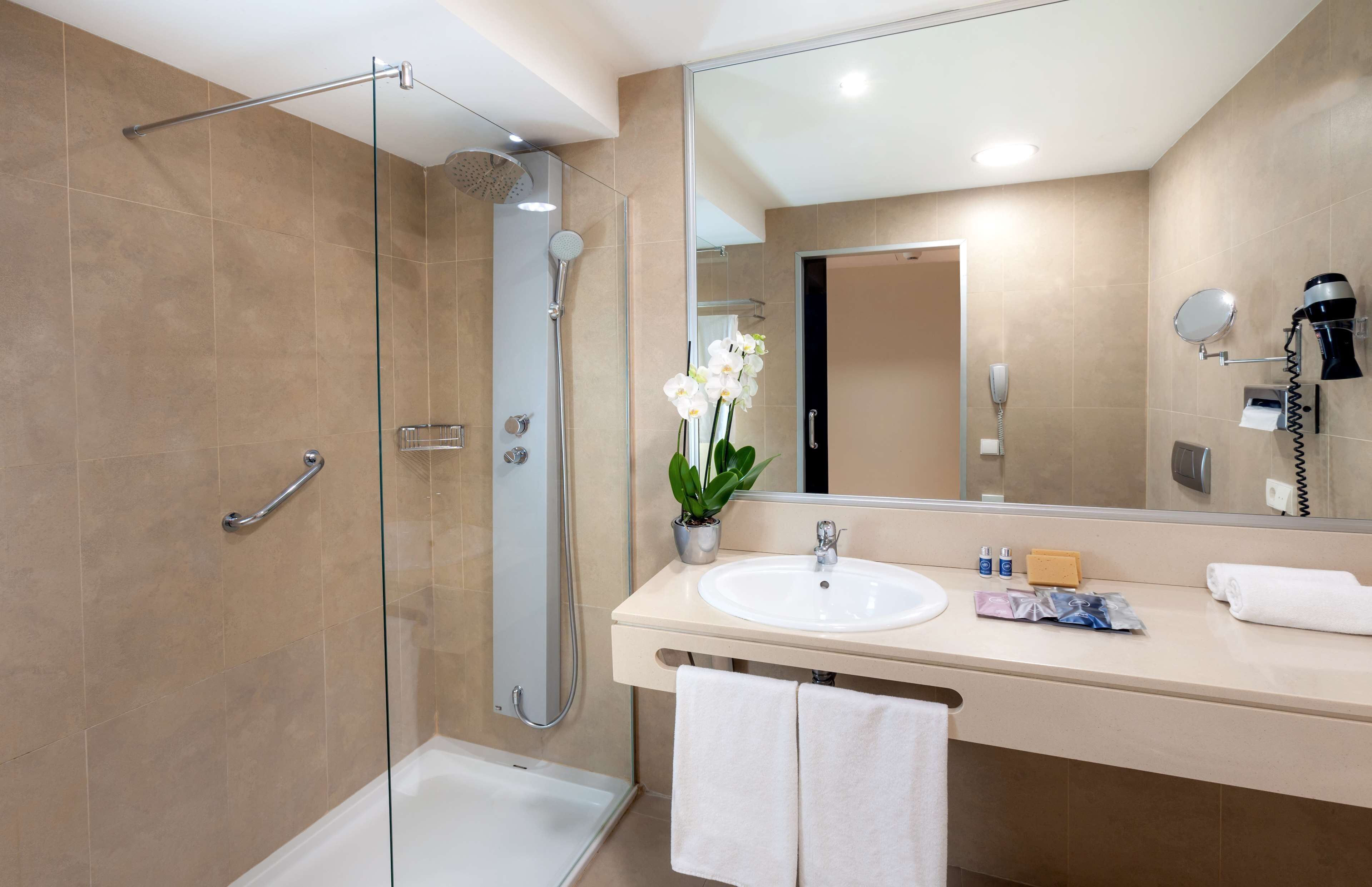 free toiletries, hair dryer, bidet, towels