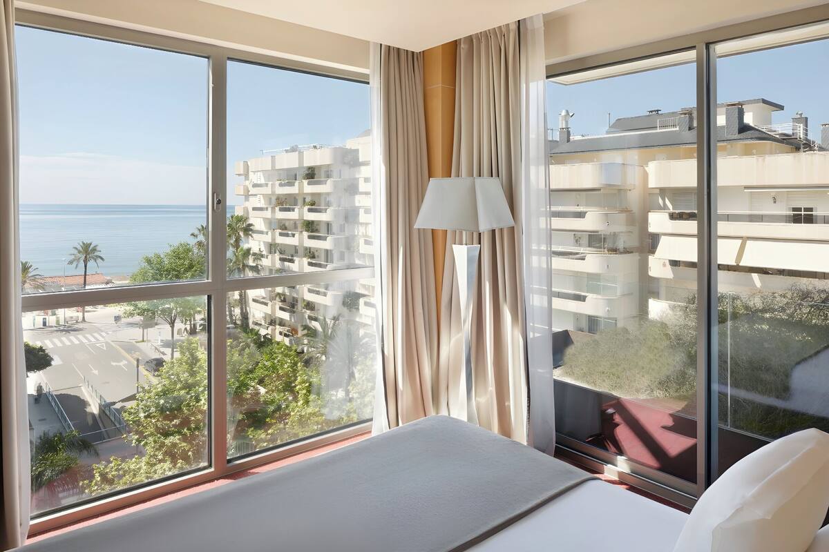 junior suite, sea view | minibar, in-room safe, desk, blackout curtains