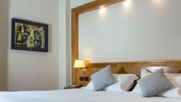 Literie hypoallergénique, minibar, coffres-forts dans les chambres