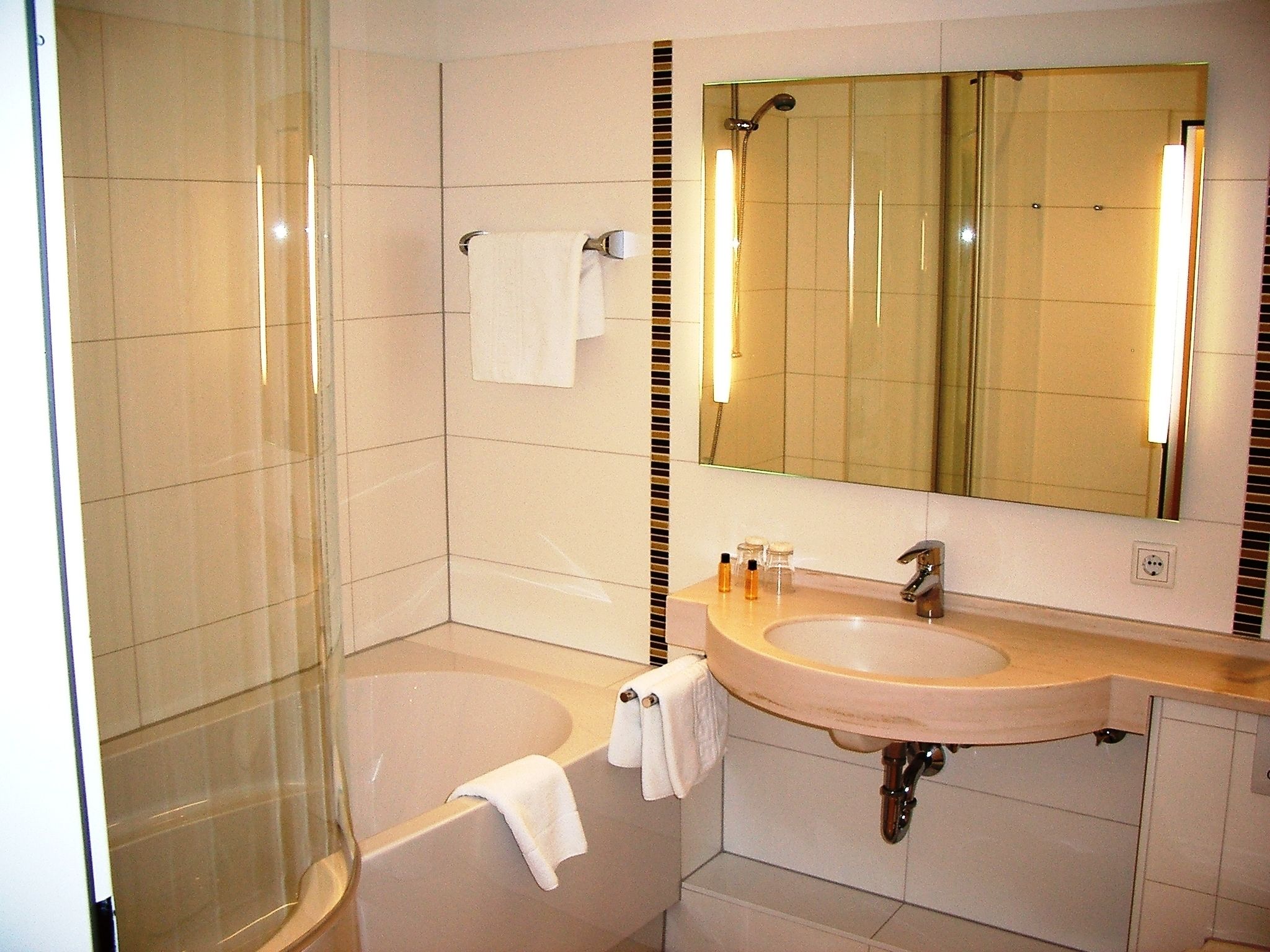 standard double room | bathroom | shower, hair dryer, bathrobes, towels