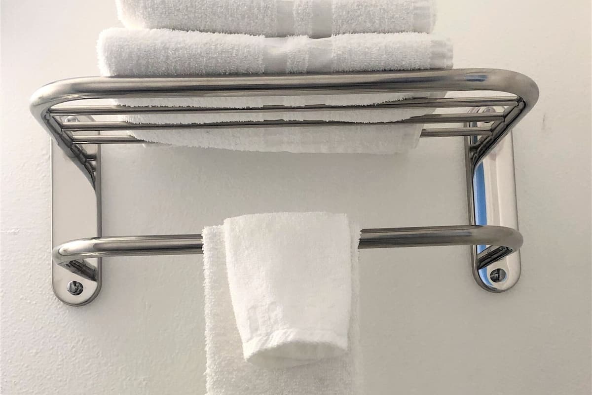 Hair dryer, towels, soap, shampoo