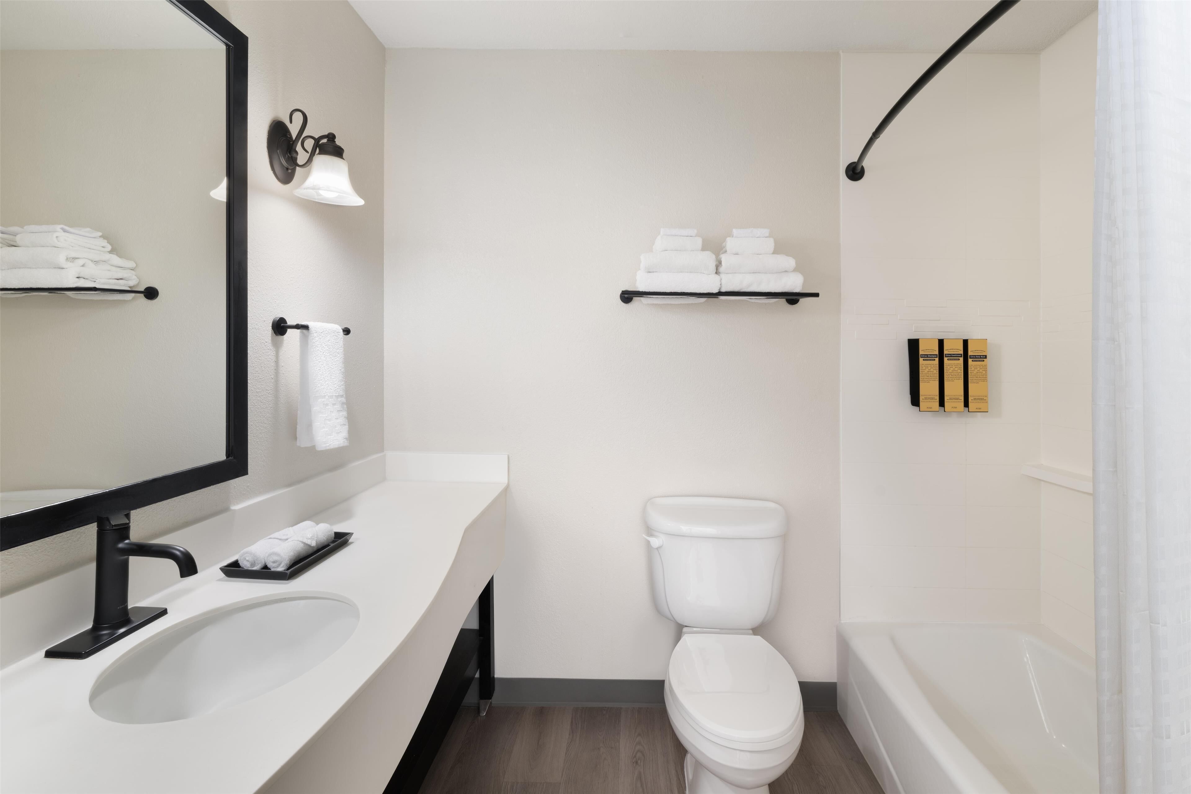 standard room, 2 queen beds, non smoking, refrigerator & microwave | bathroom | free toiletries, hair dryer, towels