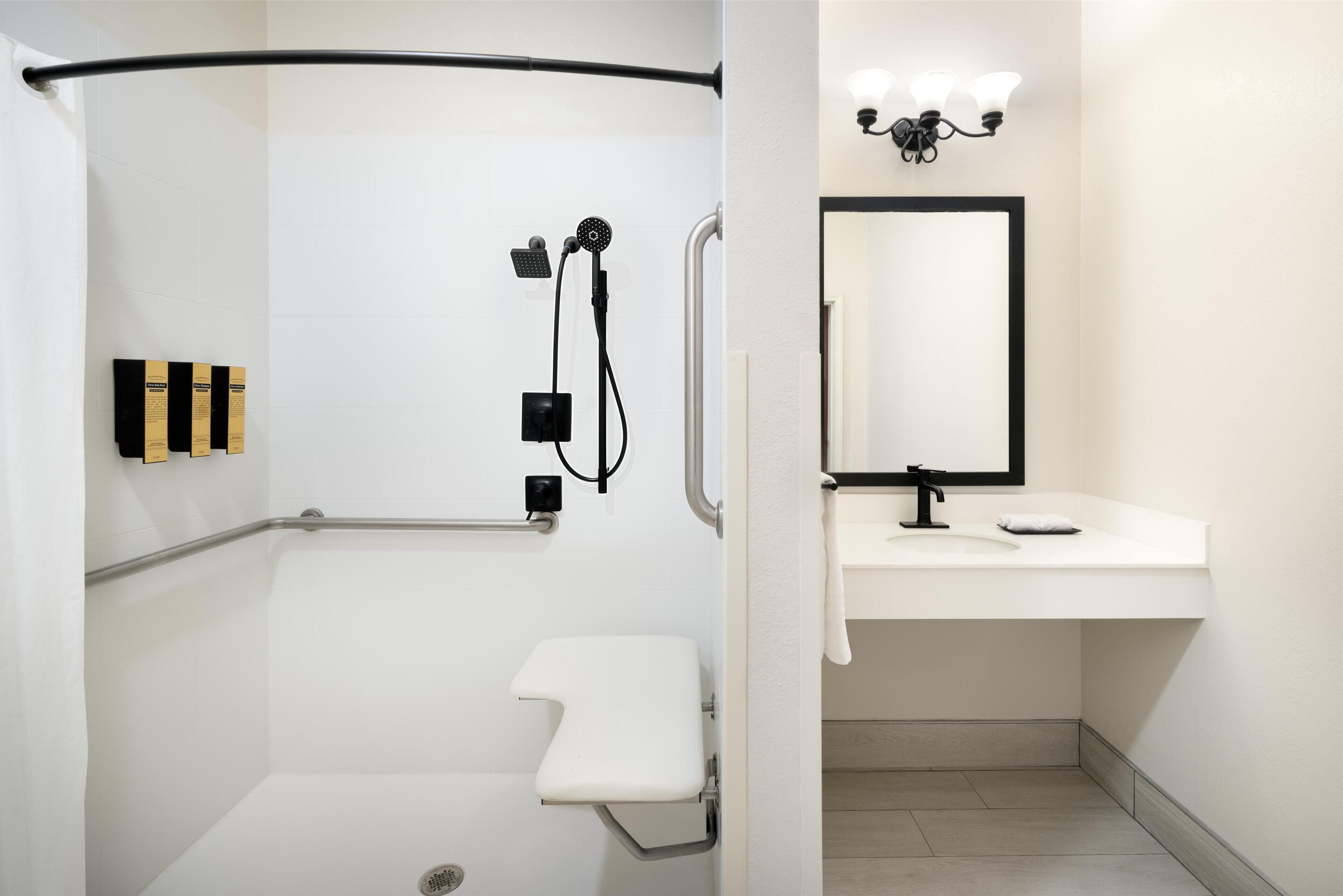 standard room, 1 king bed, accessible, refrigerator & microwave (larger room;with sofabed) | bathroom | free toiletries, hair dryer, towels