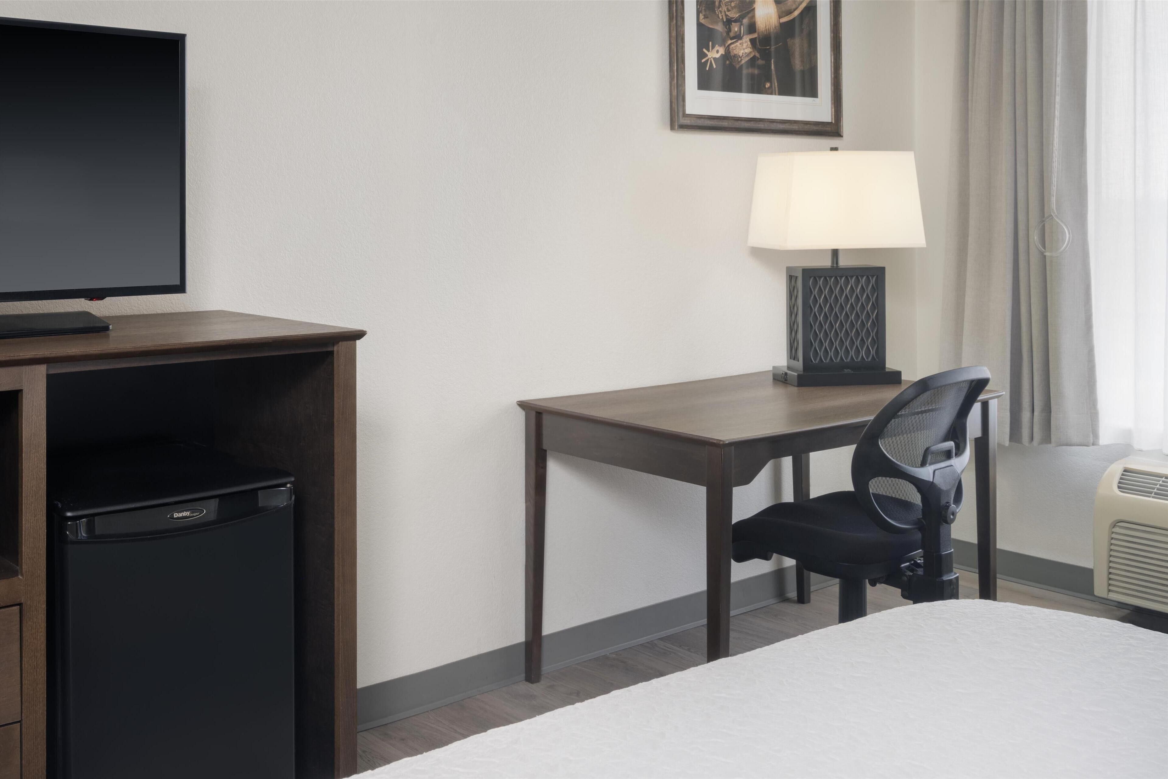 standard room, 1 king bed, non smoking, refrigerator & microwave | in-room safe, desk, blackout curtains, iron/ironing board