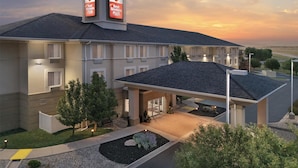 A hotel with a modern design, featuring a prominent sign indicating it is part of the Best Western Plus chain. - Best Western Plus Frontier Inn (Cheyenne)