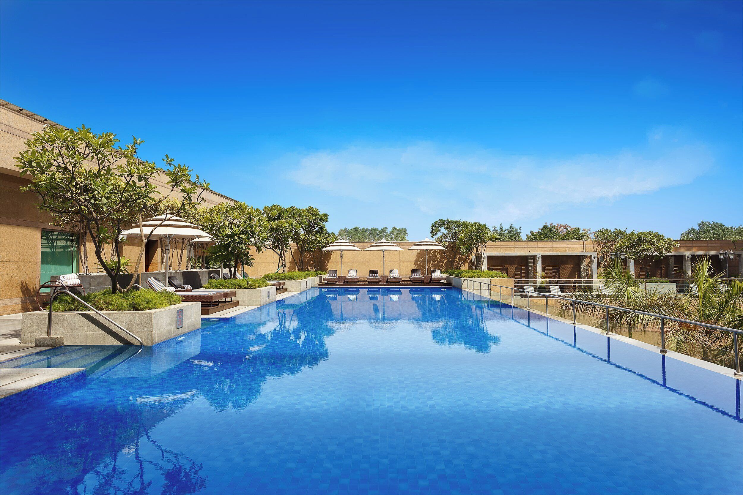 Outdoor pool, pool umbrellas, pool loungers