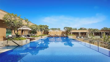 Outdoor pool, pool umbrellas, pool loungers