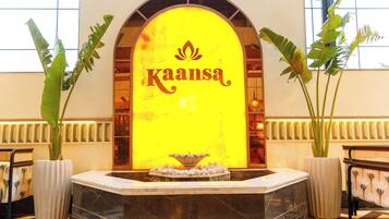 Welcome to Kaansa, where a beautiful fountain and elegant reception area set the tone for a memorable stay.