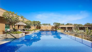 Outdoor pool, pool umbrellas, pool loungers