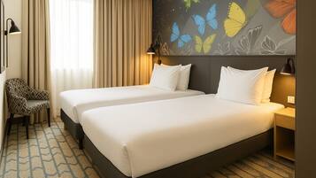 Habitación estándar, 2 camas individuales | Caja fuerte, escritorio, sistema de insonorización