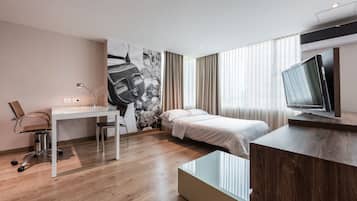 Ropa de cama de alta calidad y minibar