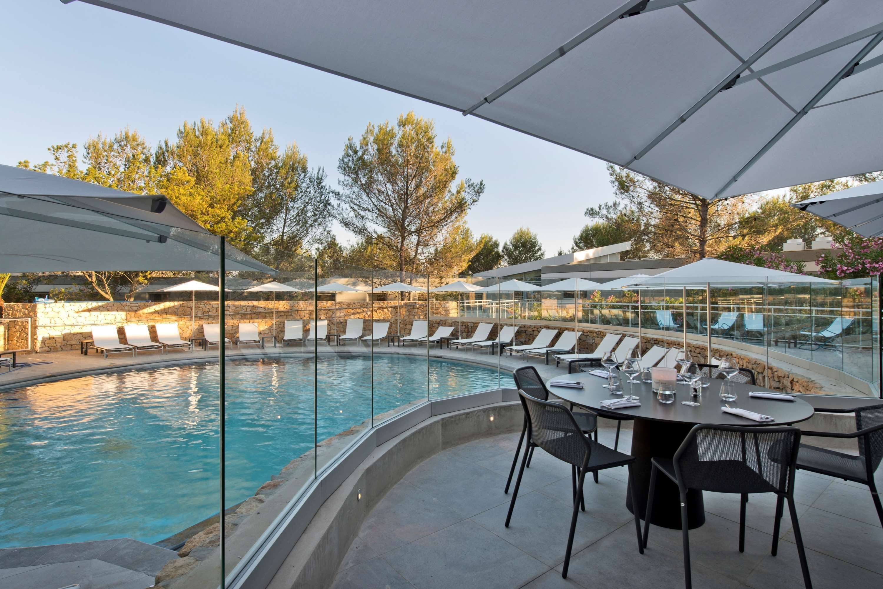 seasonal outdoor pool, pool umbrellas, pool loungers