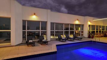Outdoor pool, pool umbrellas, pool loungers