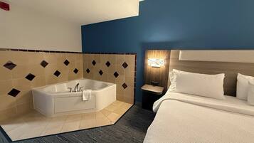 Suite, 1 King Bed, Jetted Tub | Hypo-allergenic bedding, in-room safe, desk, laptop workspace
