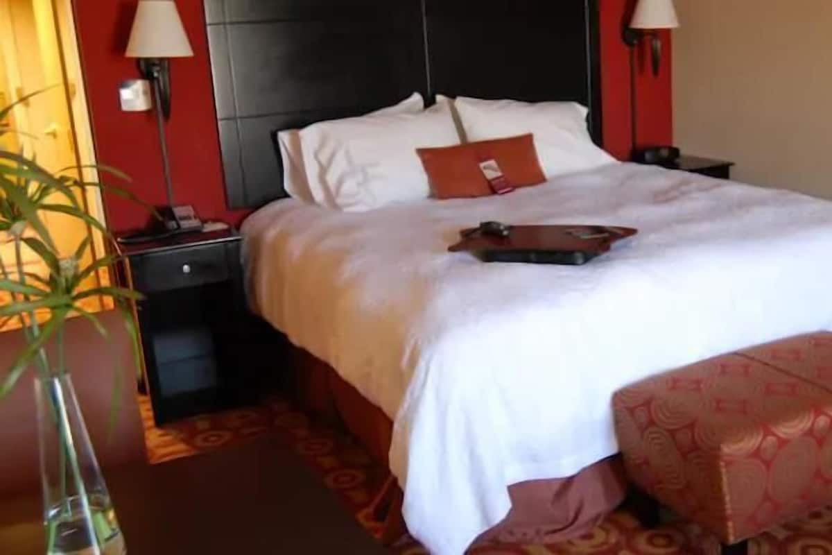 Desk, laptop workspace, blackout curtains, iron/ironing board