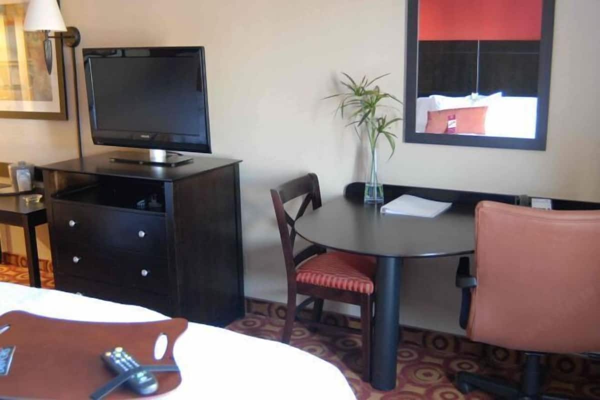 Desk, laptop workspace, blackout curtains, iron/ironing board