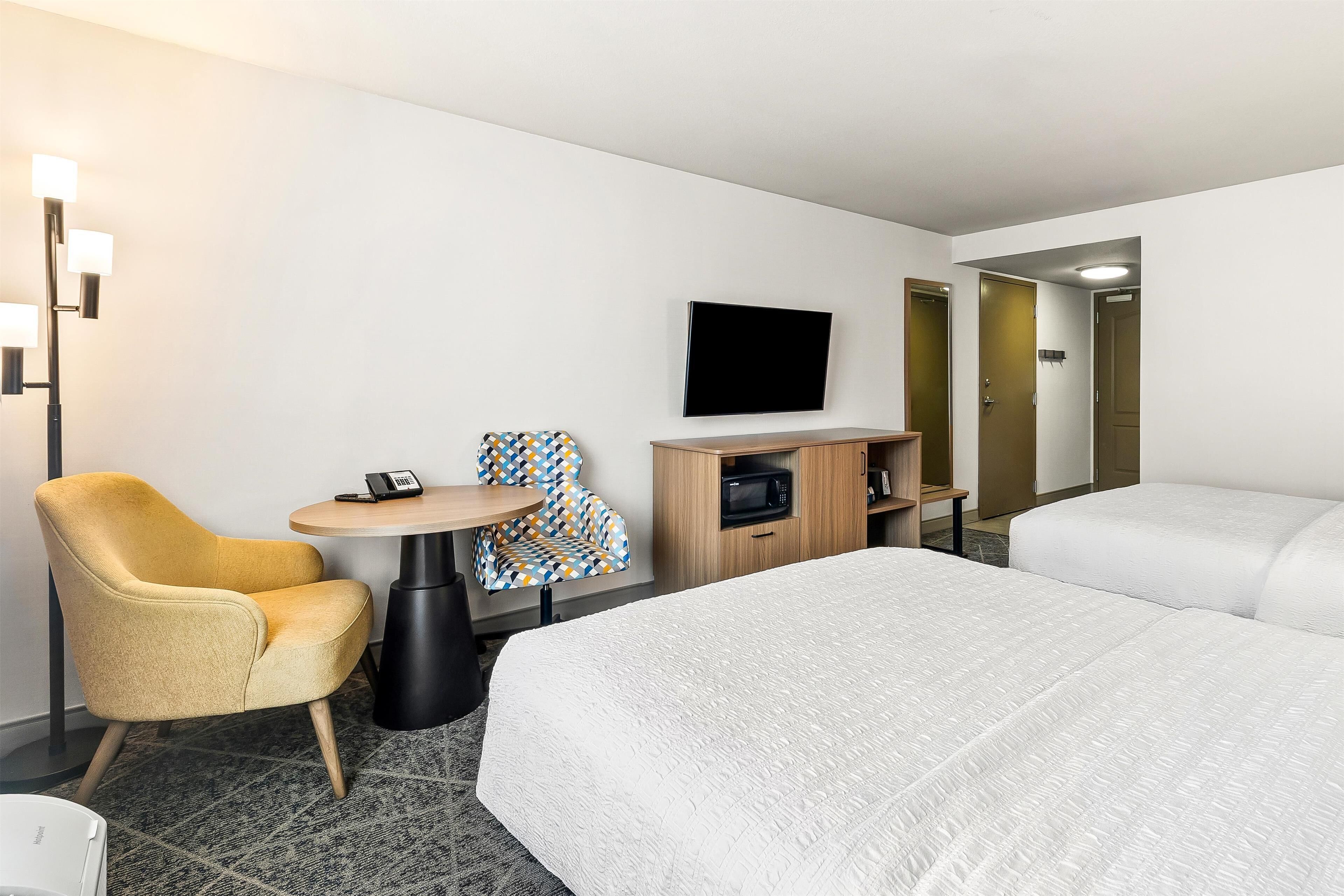 two queen beds non smoking | in-room safe, desk, iron/ironing board, free cots/infant beds