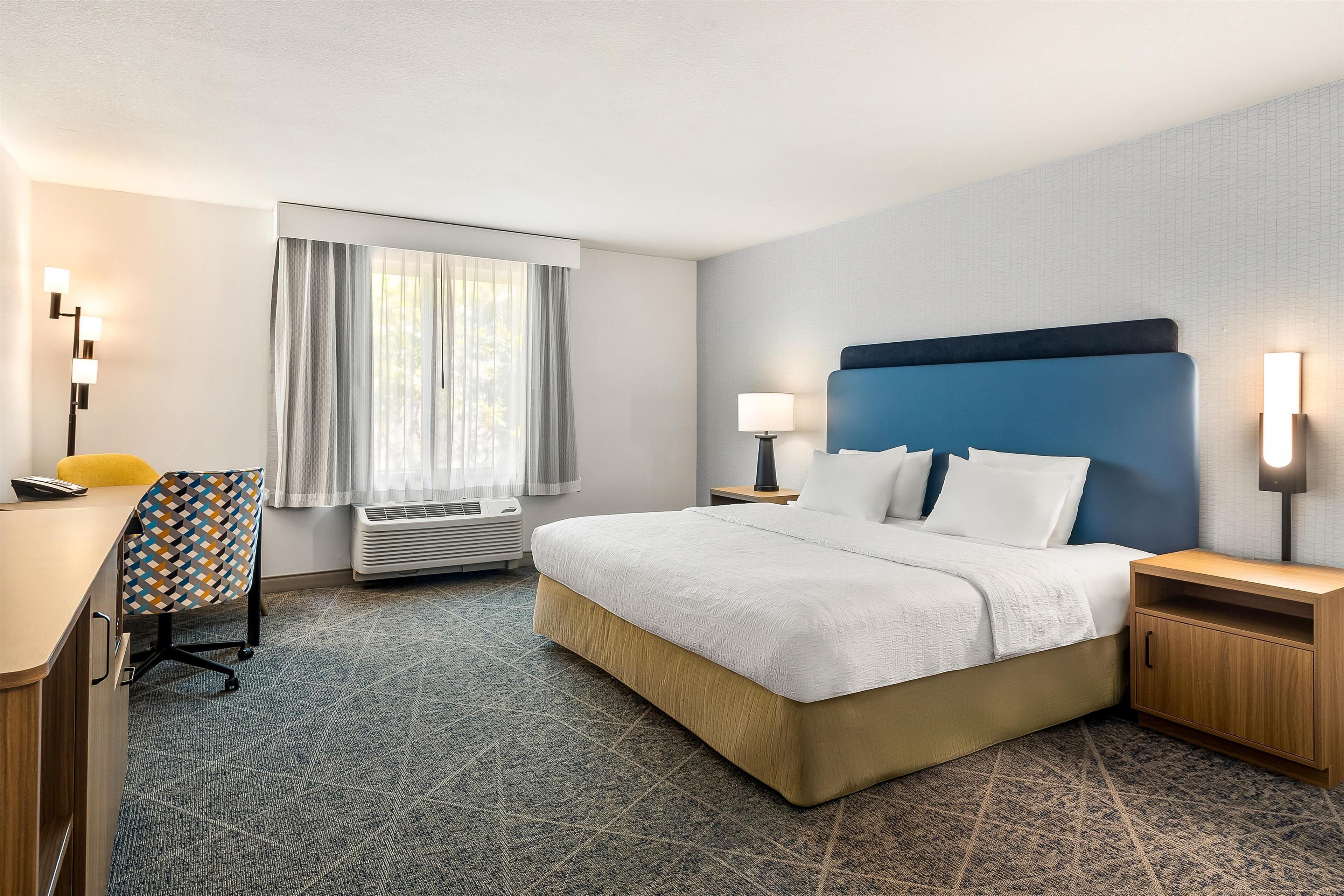 room, 1 king bed, accessible, non smoking | in-room safe, desk, iron/ironing board, free cots/infant beds