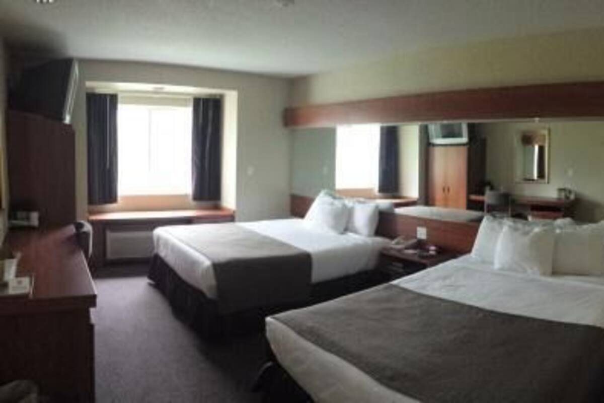 In-room safe, desk, iron/ironing board, free cribs/infant beds