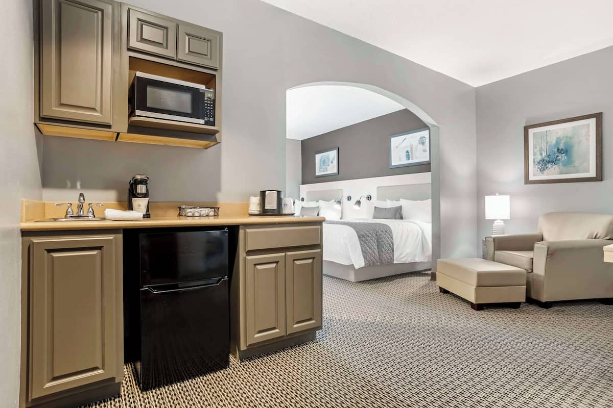 suite, 2 queen beds, non smoking, kitchenette | desk, laptop workspace, iron/ironing board, wifi