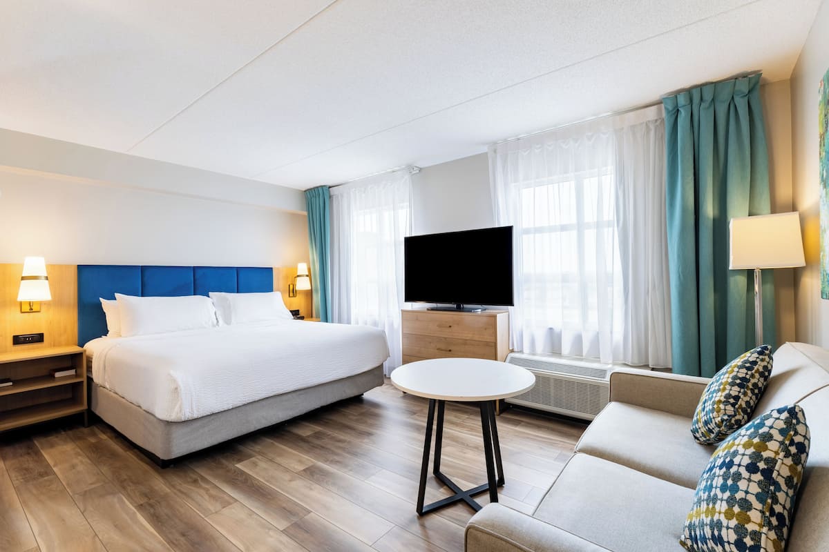 Suite estudio, 1 cama de matrimonio grande con sofá cama, cocina | Escritorio, espacio para trabajar con un portátil, cortinas opacas