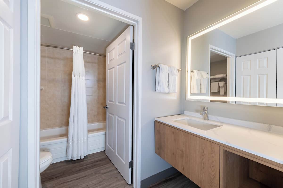 Suite, 1 Bedroom, Kitchen | 1 bedroom, desk, laptop workspace, blackout curtains