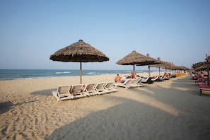Beach nearby, beach umbrellas, beach towels - River Beach Resort and Residences (Da Nang)