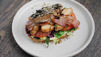 A sandwich on a plate.
