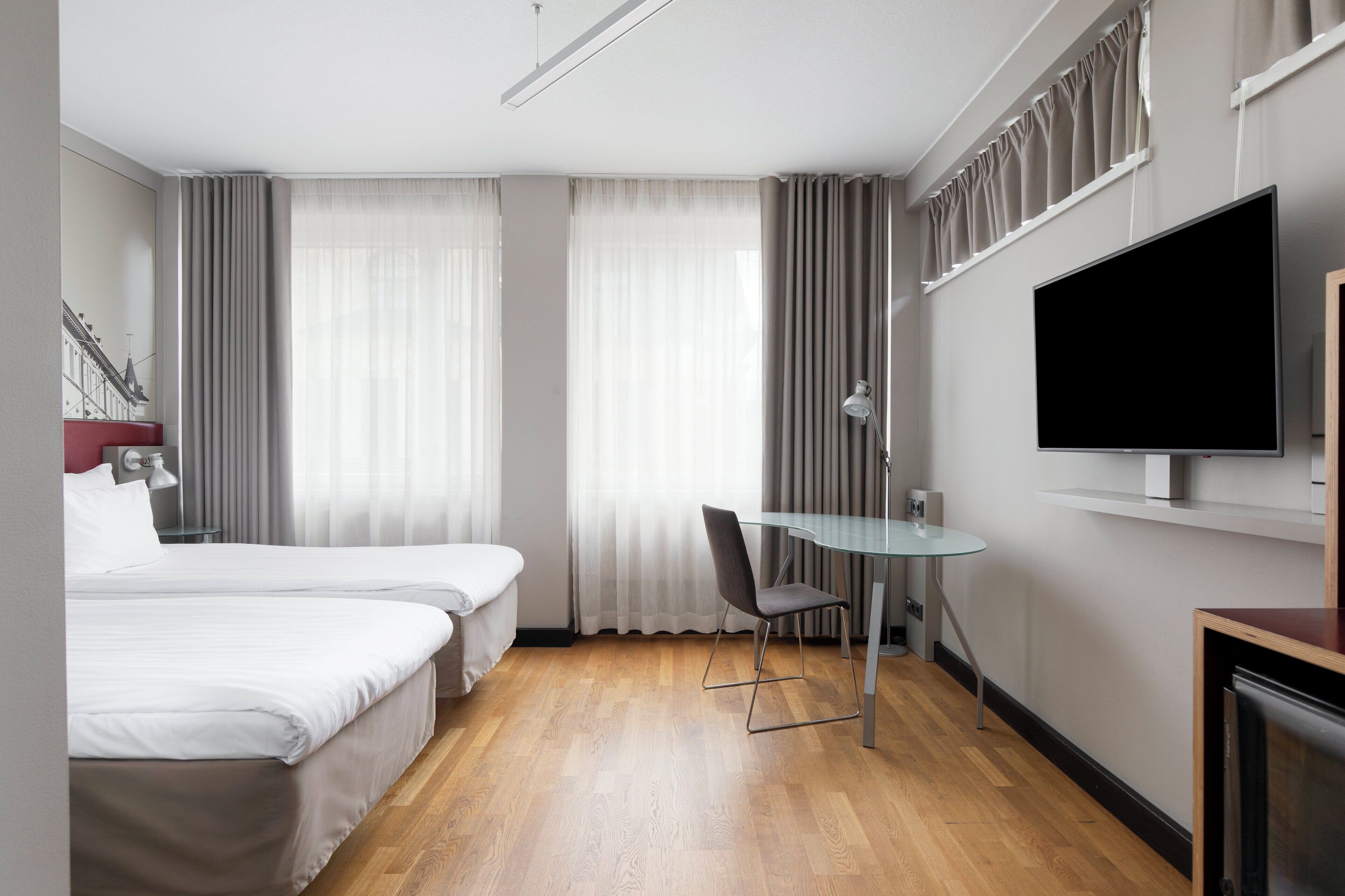 standard twin room | in-room safe, desk, blackout curtains, soundproofing