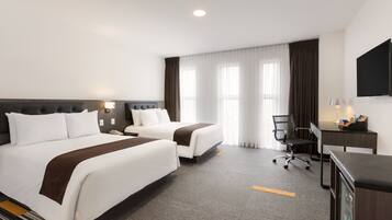 Premium bedding, down comforters, minibar, in-room safe