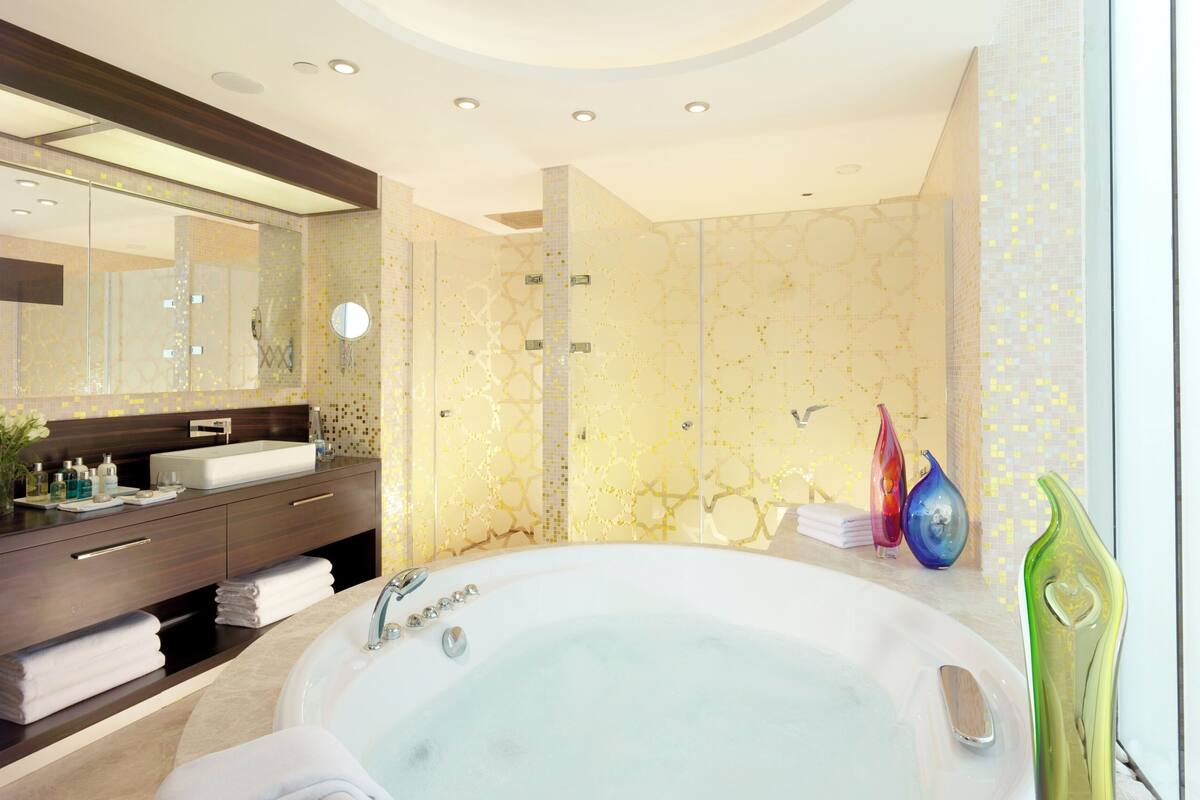 presidential suite, 1 king bed with sofa bed | bathroom | eco-friendly toiletries, hair dryer, bathrobes, slippers