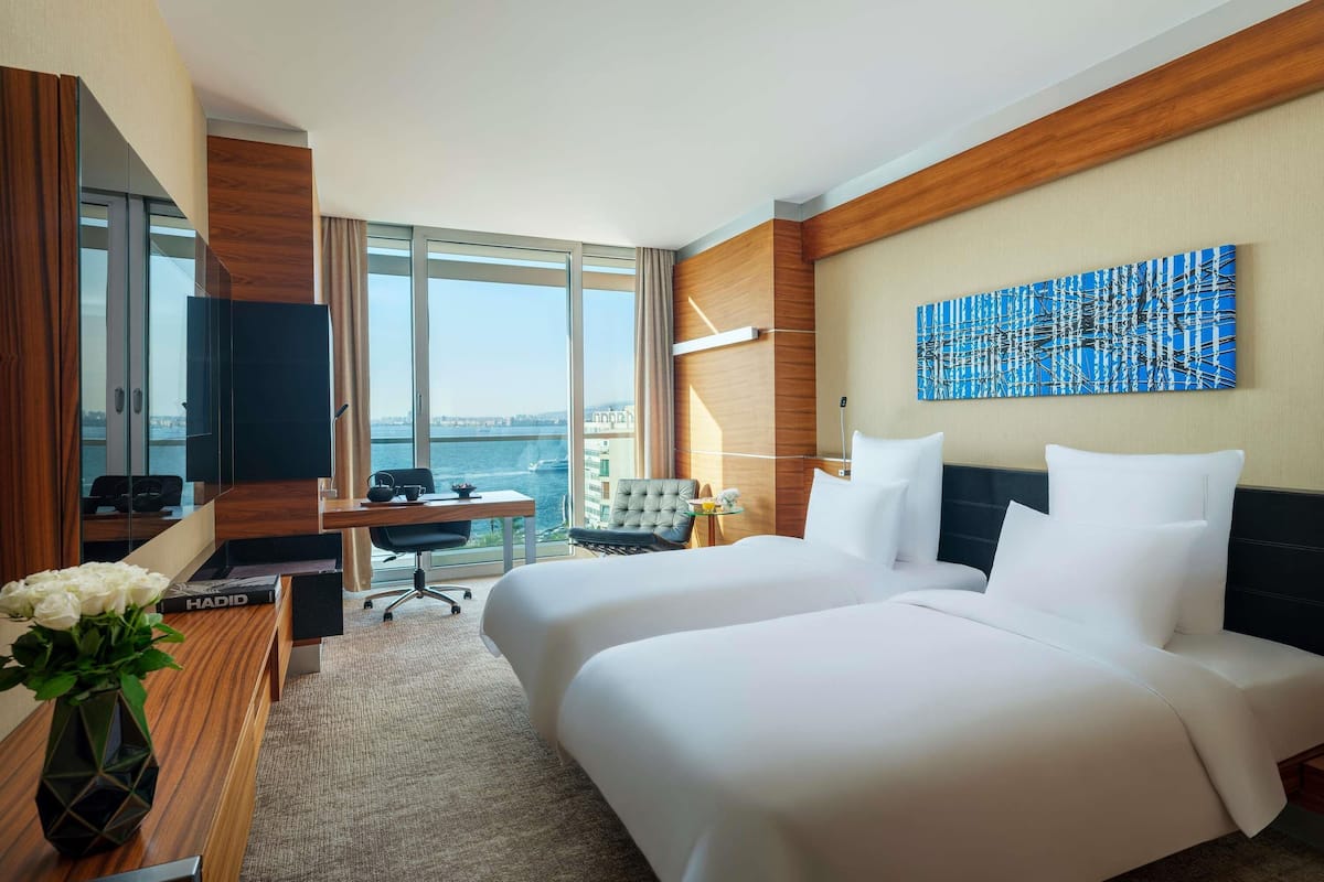 Literie de qualité, minibar, coffre-fort, décor unique