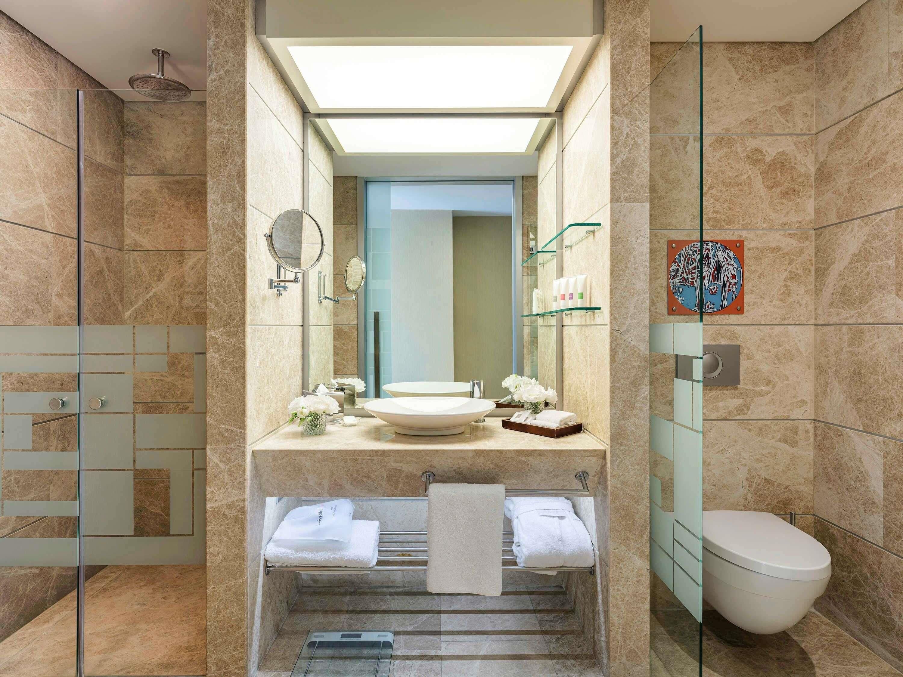 Eco-friendly toiletries, hair dryer, bathrobes, slippers