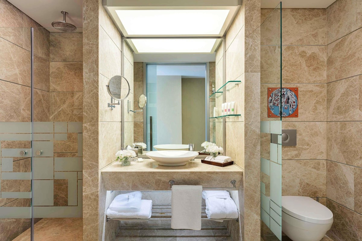 Eco-friendly toiletries, hair dryer, bathrobes, slippers