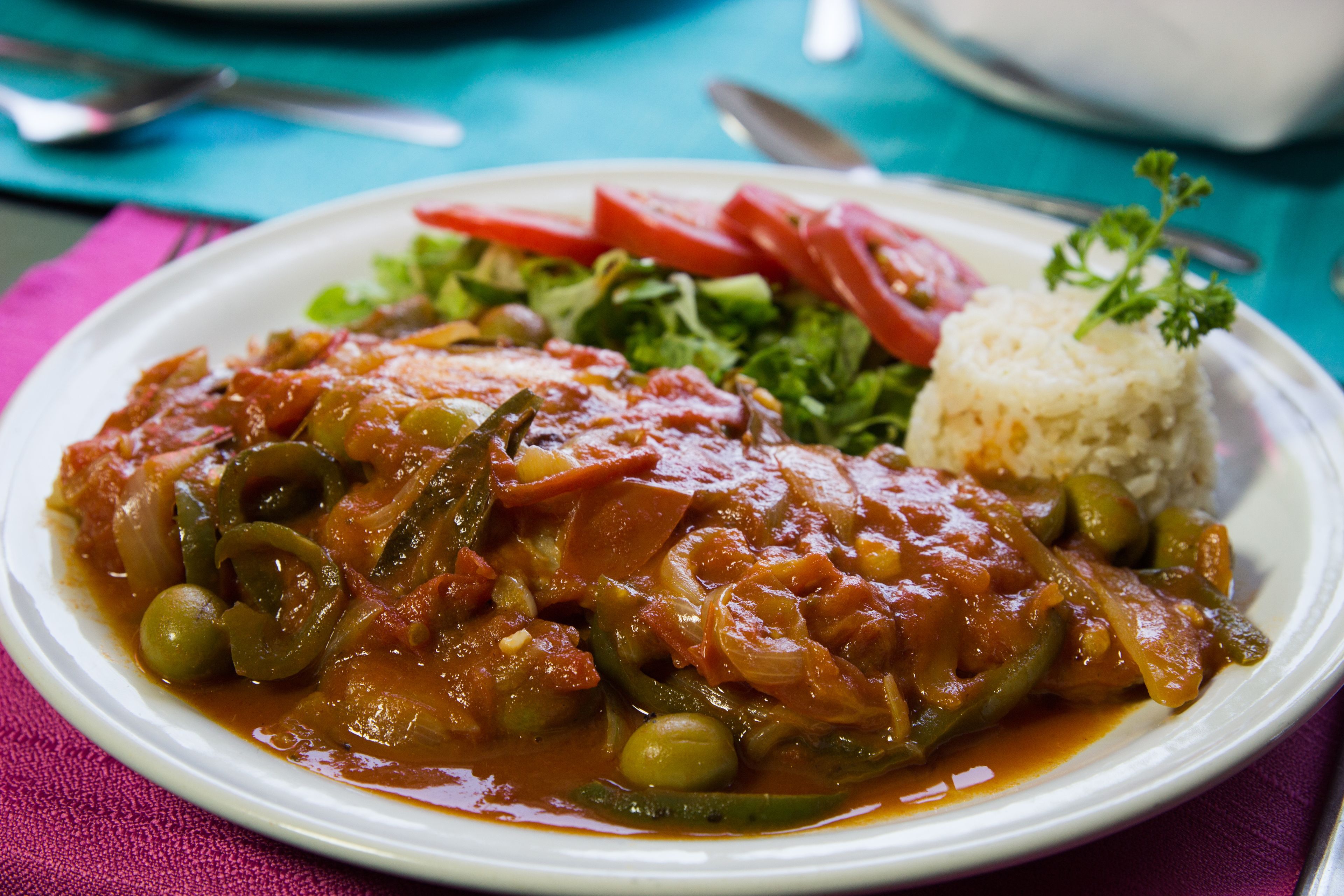 A plate of food with rice and vegetables.