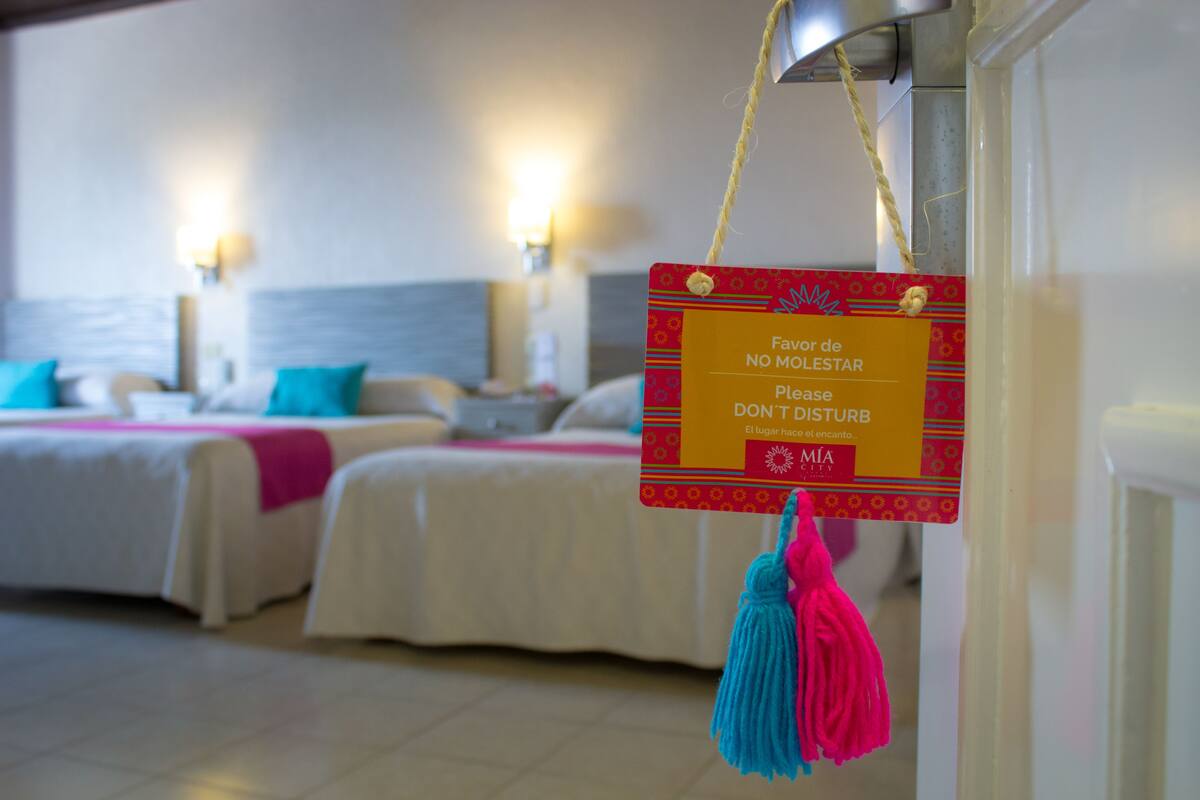 Family Room | Premium bedding, in-room safe, desk, iron/ironing board