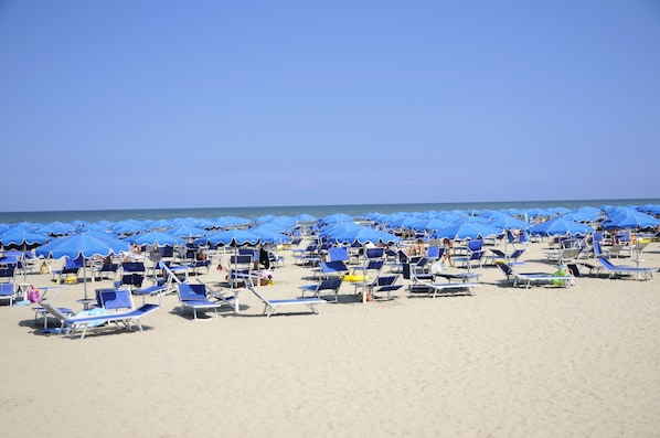 Beach nearby, white sand, free beach shuttle, sun loungers