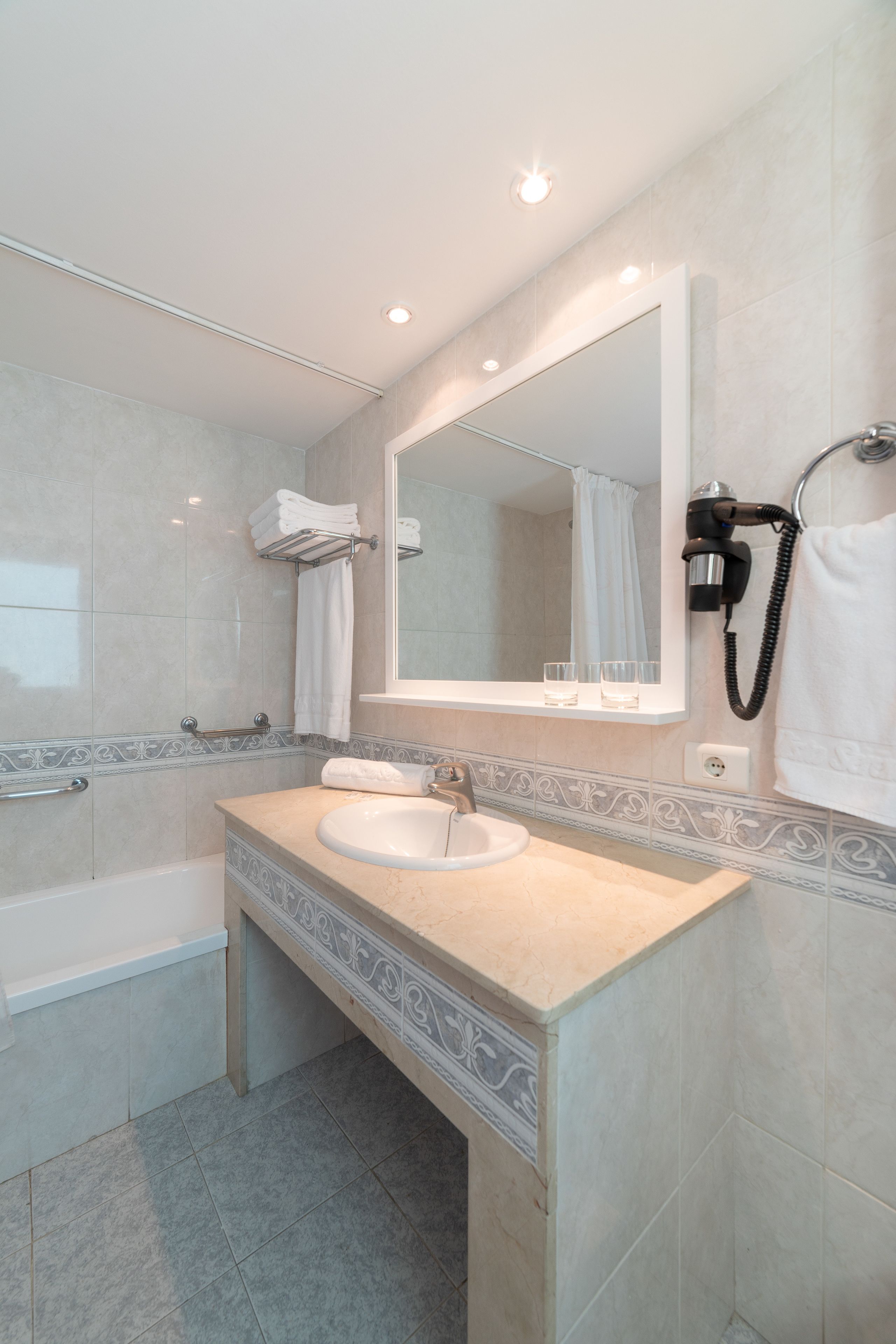 hair dryer, bidet, towels