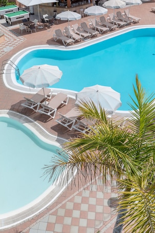 Outdoor pool, open 10:00 AM to 6 PM, pool umbrellas, sun loungers