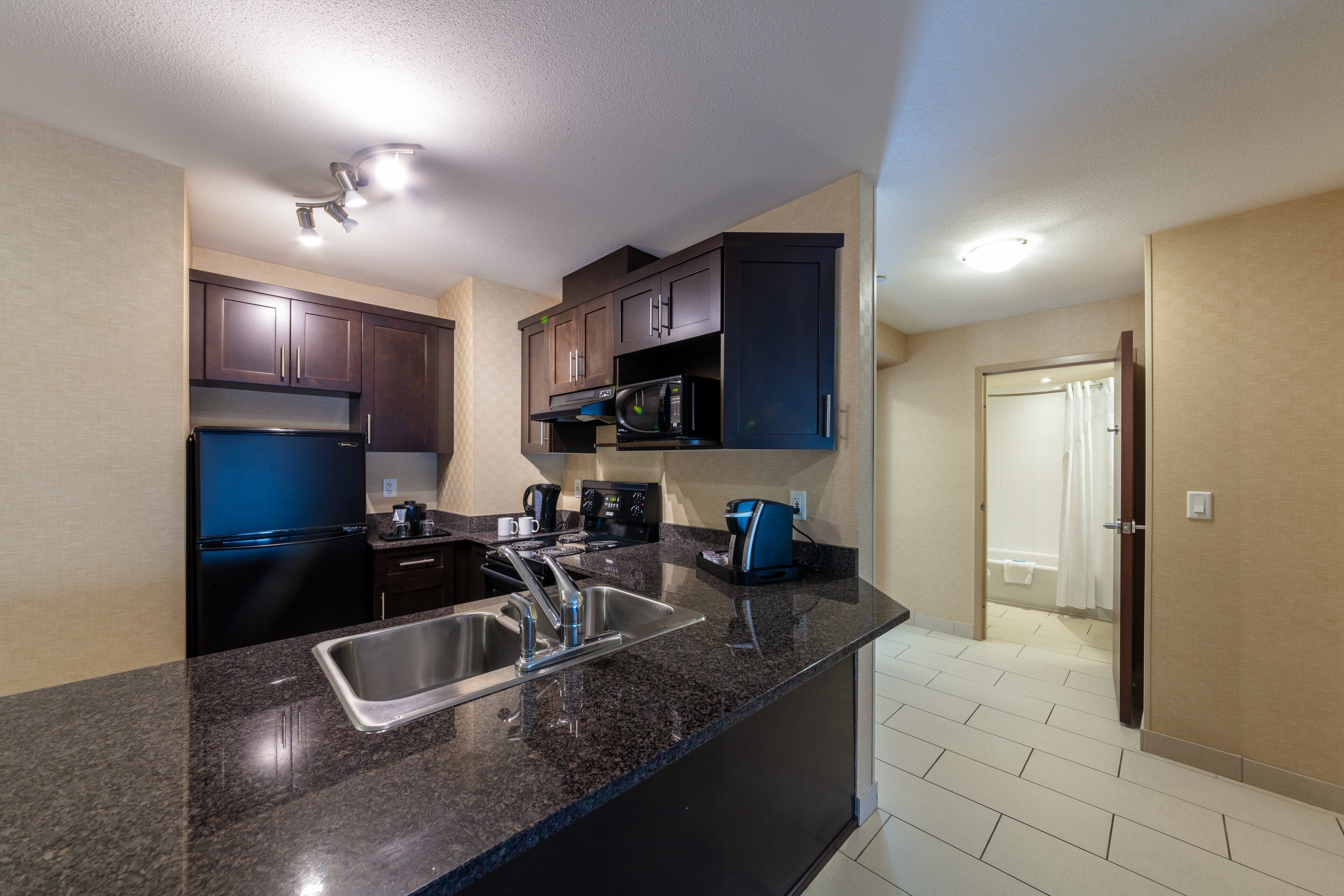 suite, 2 bedrooms | 1 bedroom, premium bedding, in-room safe, desk