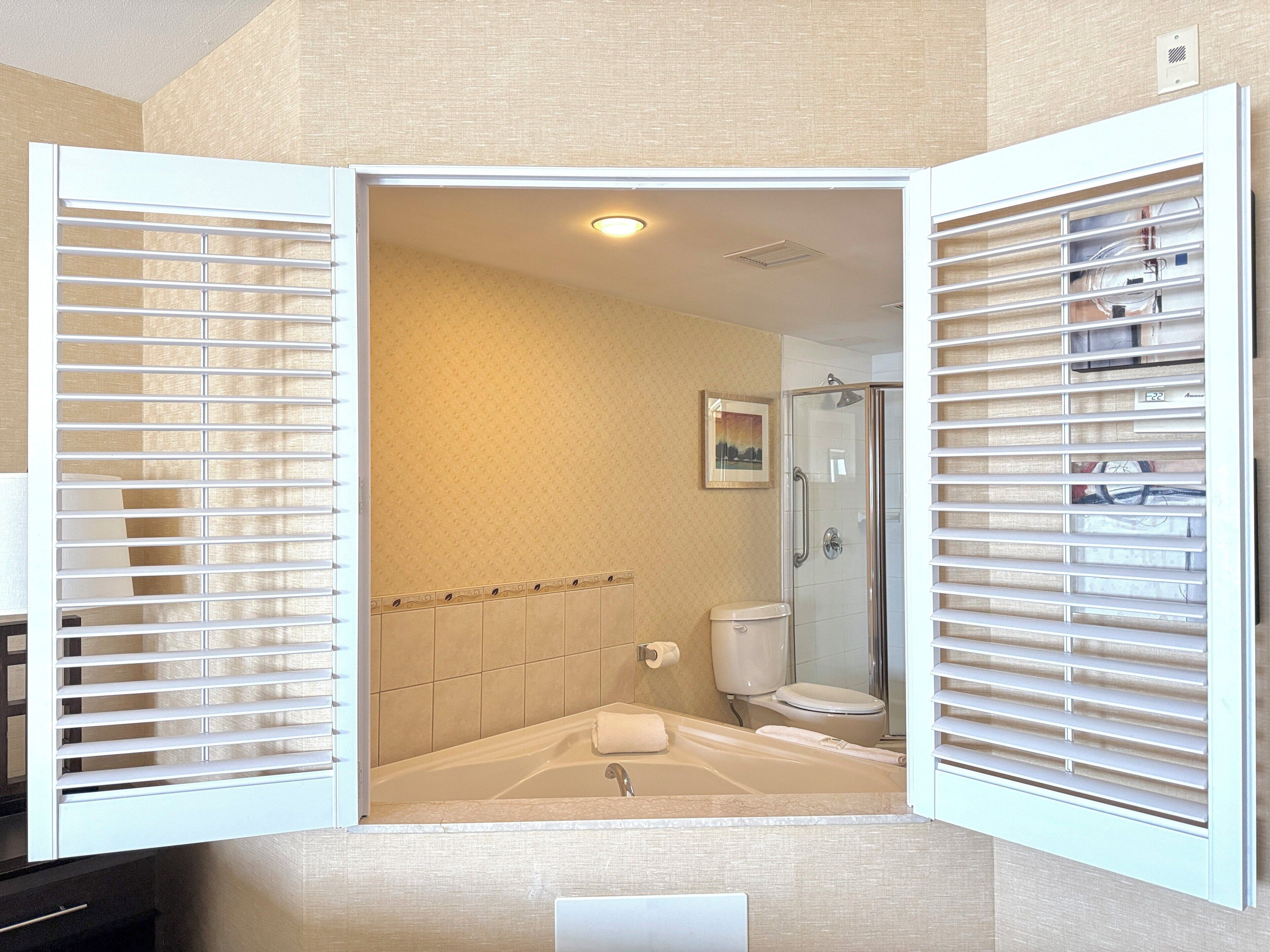 Suite, 1 cama King size, hidromasaje | Ropa de cama de alta calidad y caja de seguridad en la habitación 