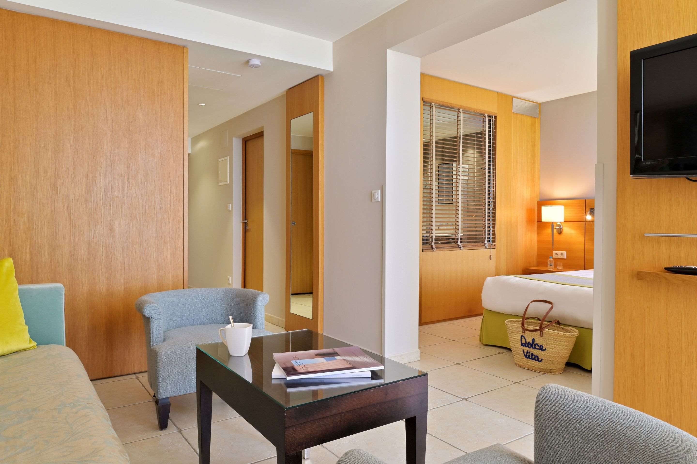 suite, sea view | minibar, in-room safe, desk, blackout curtains