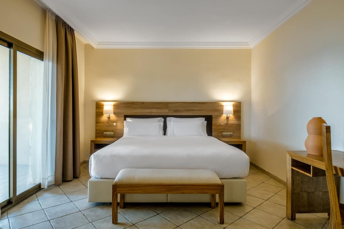 family room, sea view | in-room safe, desk, iron/ironing board, cots/infant beds