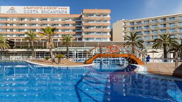 Indoor pool, outdoor pool, pool umbrellas, pool loungers