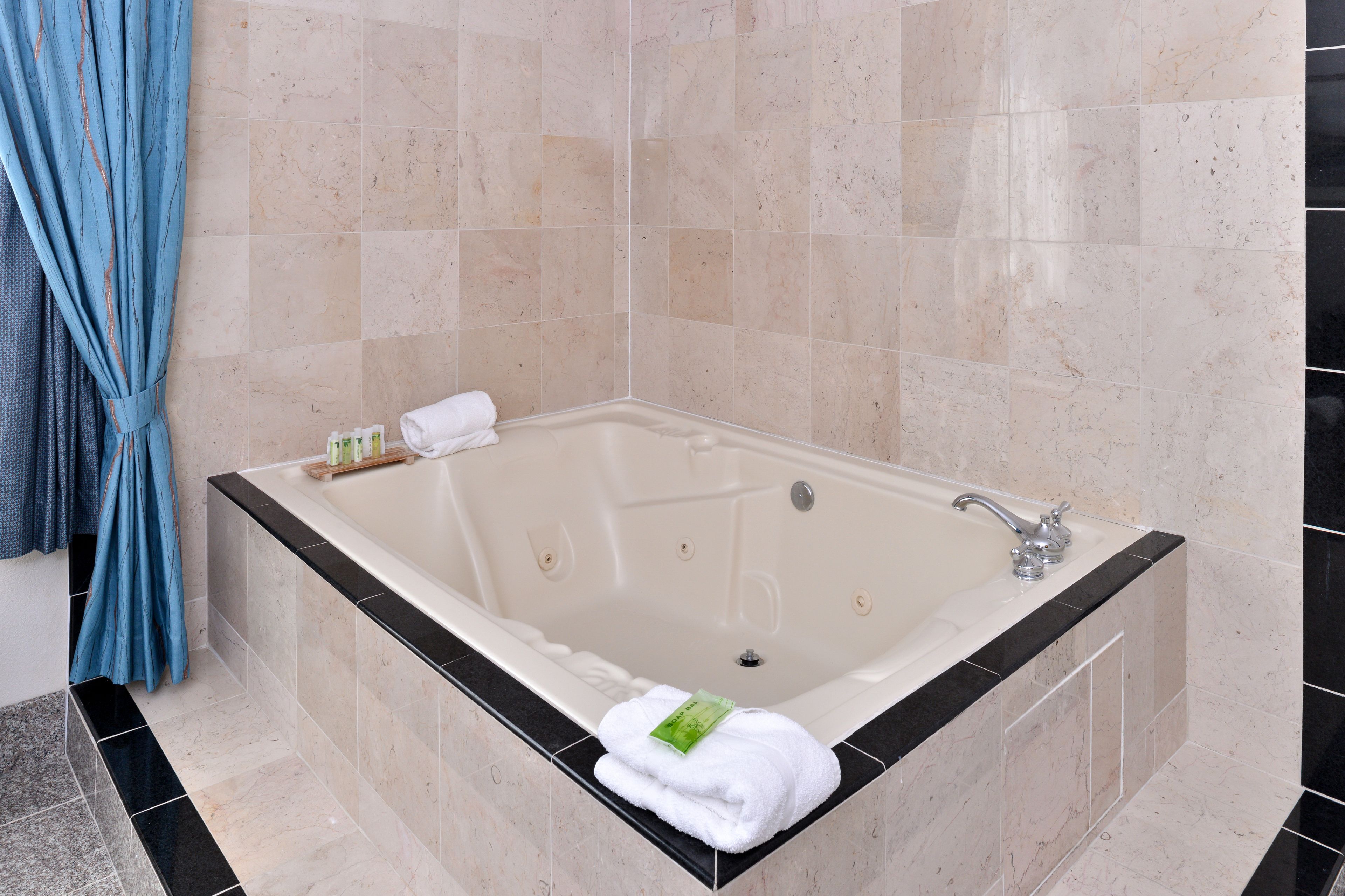 suite, 1 bedroom, jetted tub | 1 bedroom, desk, laptop workspace, blackout curtains