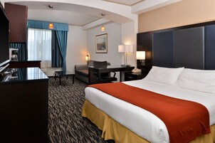 Suite, 1 Bedroom (1 King, Sofa Bed) | Desk, laptop workspace, blackout drapes, iron/ironing board