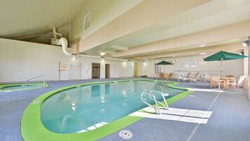 Indoor pool, open 7:00 AM to 10:00 PM, pool umbrellas, pool loungers