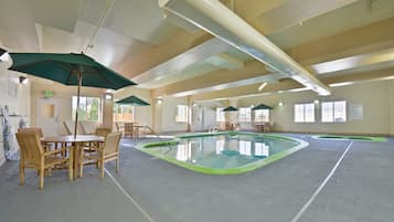 Indoor pool, open 7:00 AM to 10:00 PM, pool umbrellas, sun loungers